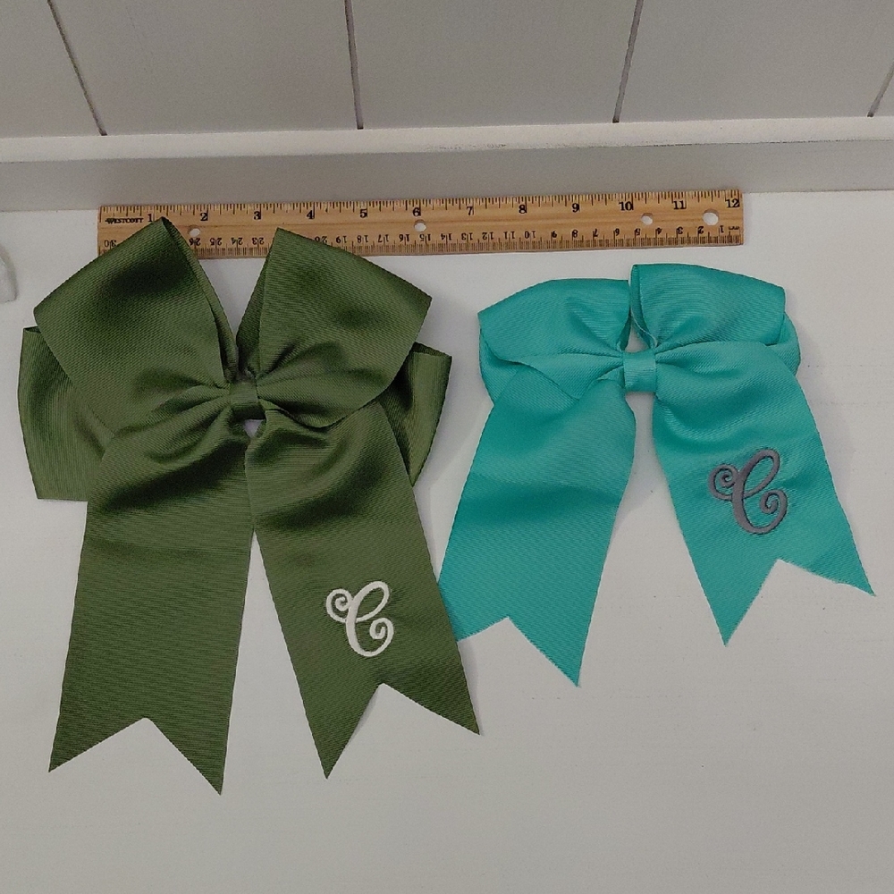 2 NEW Stitched "C" Bows